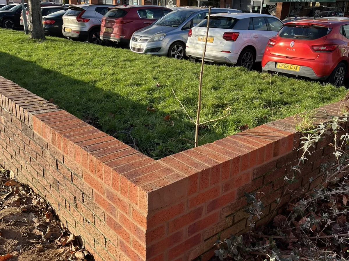Garden wall with pillar by RLG Construction