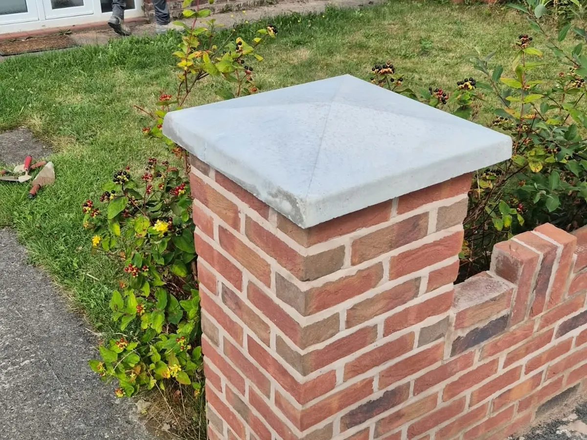 Capped brick pillar by RLG Construction